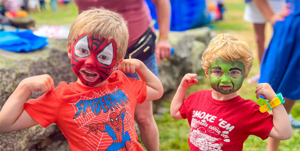 Kids painted as Spider Man and Hulk by Face Painter NH