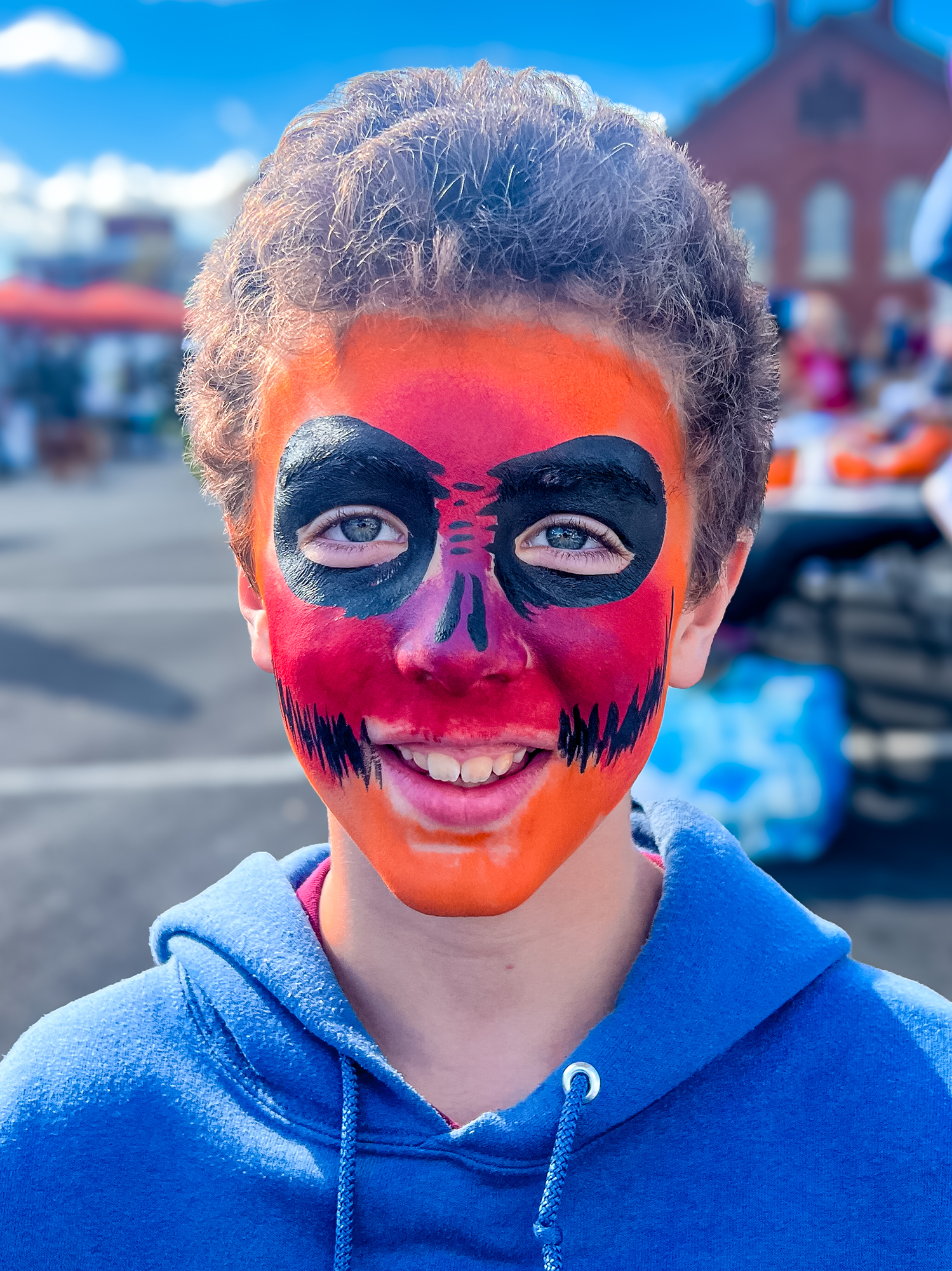 A boy wearing face paint